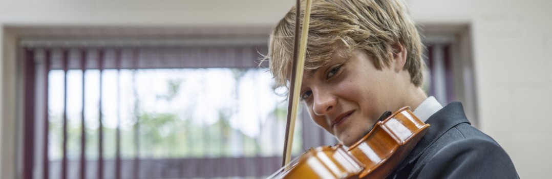 Student playing violin