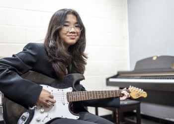 Girl Playing guitar