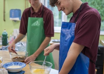 Two students cooking